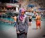 TURKEY, BUTTERFLY VALLEY: An Arab woman is not really enjoying herself at a beach in South Turkey. Photo by Claudia Wiens